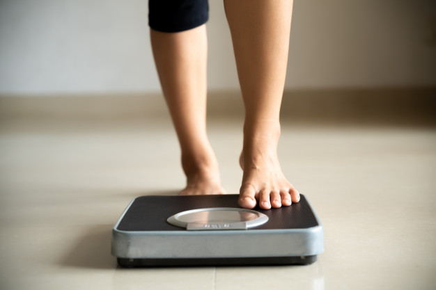 Female leg stepping weigh scales healthy lifestyle food sport concept 53476 3966